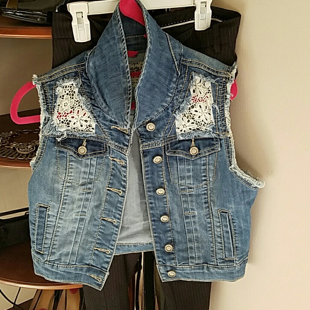 Sleeveless denim vest.