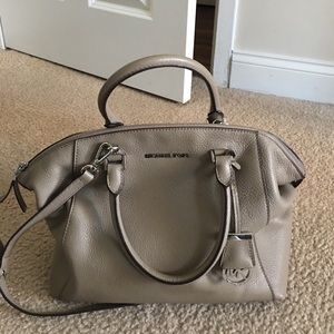 Taupe Michael kors bag.