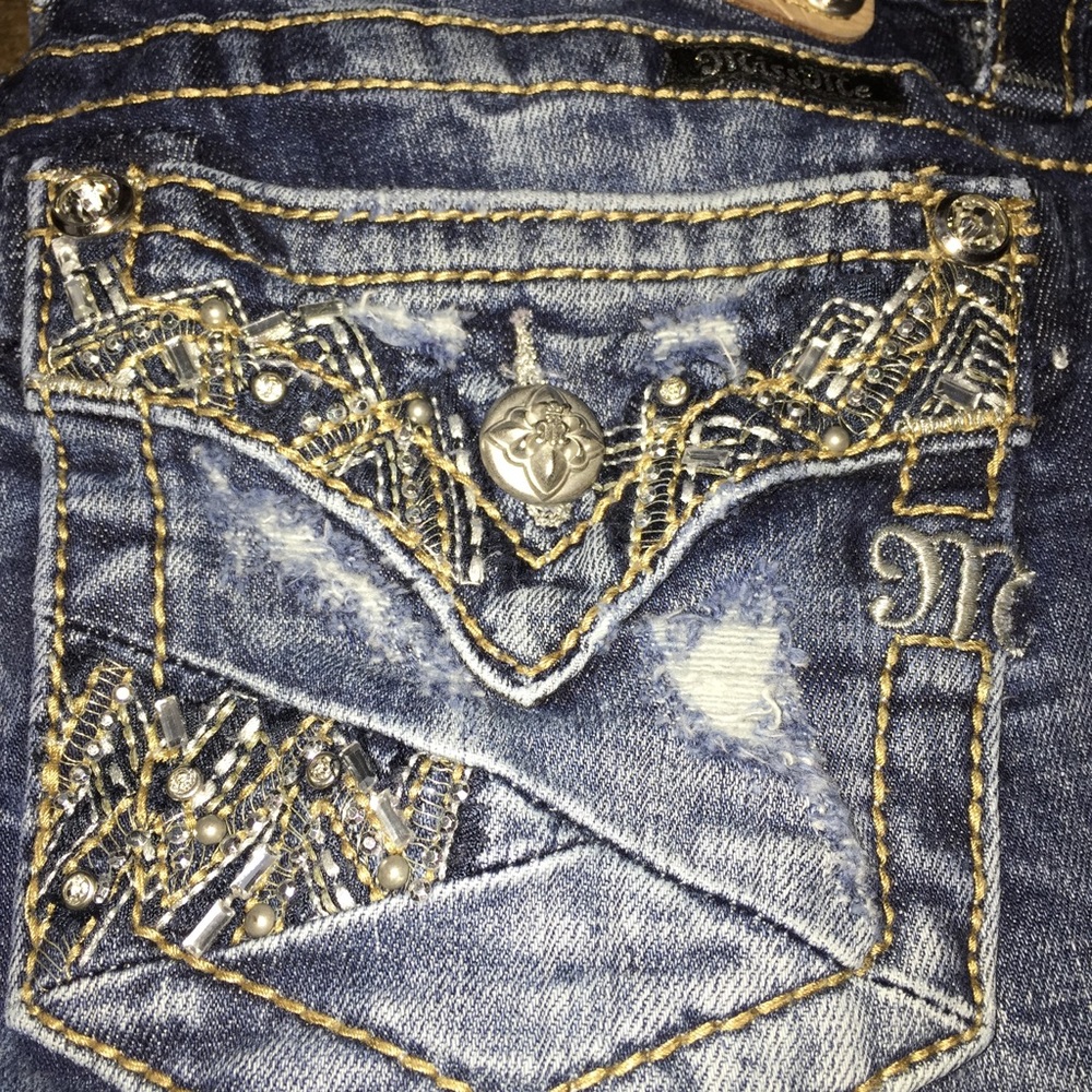 Ripped skinny Miss Me jeans