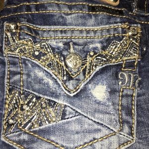 Ripped skinny Miss Me jeans