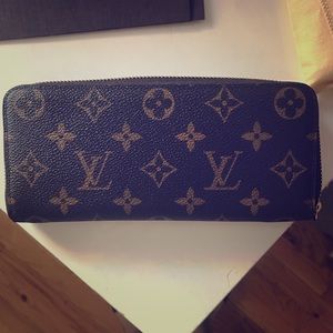 Auth Louis Vuitton Clemence wallet in fushia.