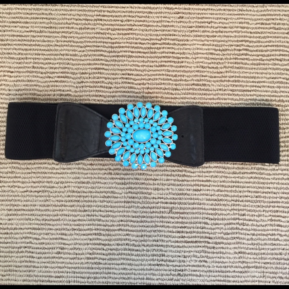 Black elastic belt with large turquoise buckle