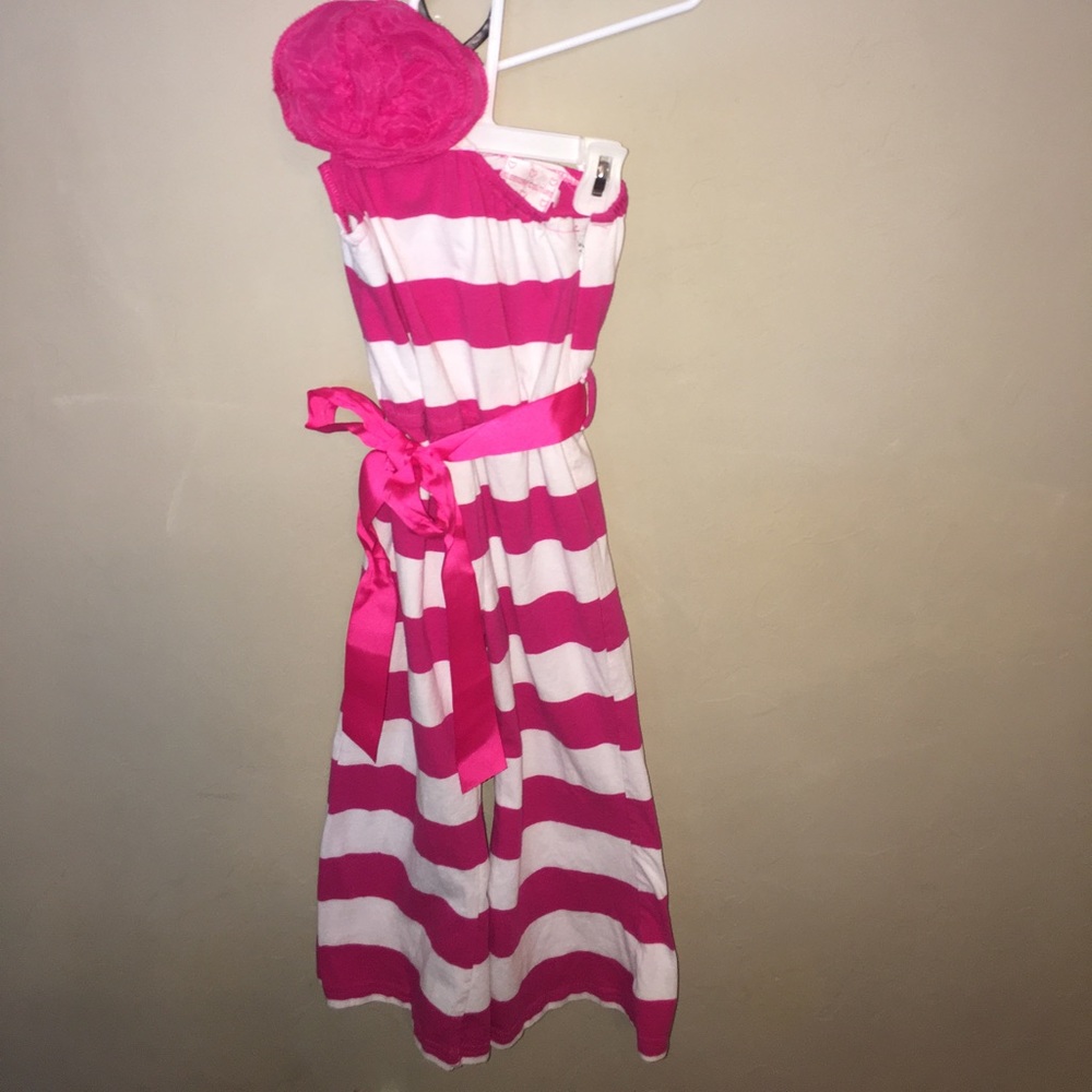 4 Rompers - 2 size 6 and 2 size 1-2