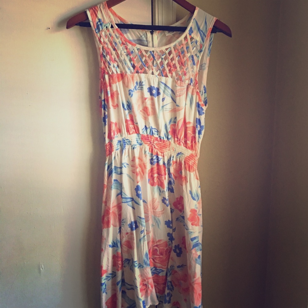 Worn once floral jeans eat size 14 dress.