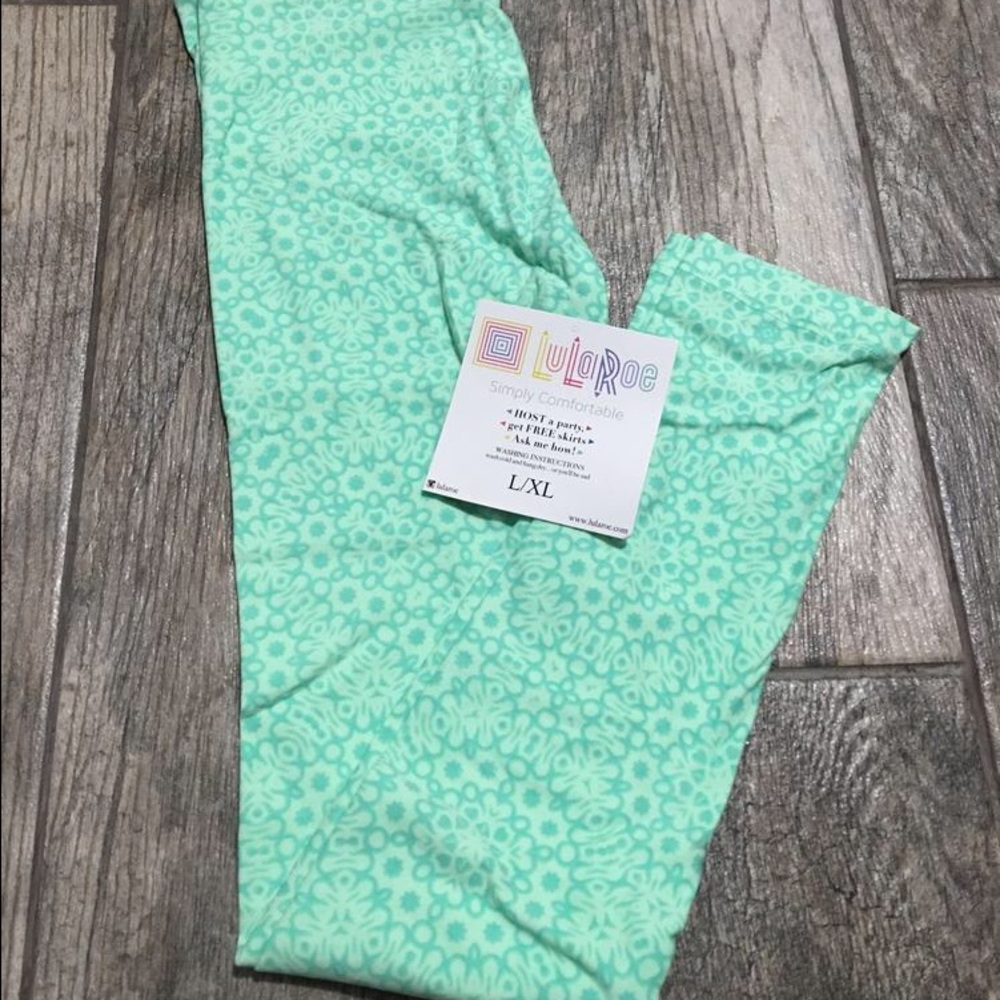 NWT Kids L/XL floral teal Leggings