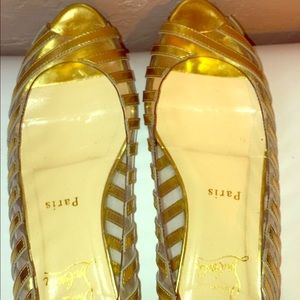 Gently used Christian Louboutin PeepToe Flats