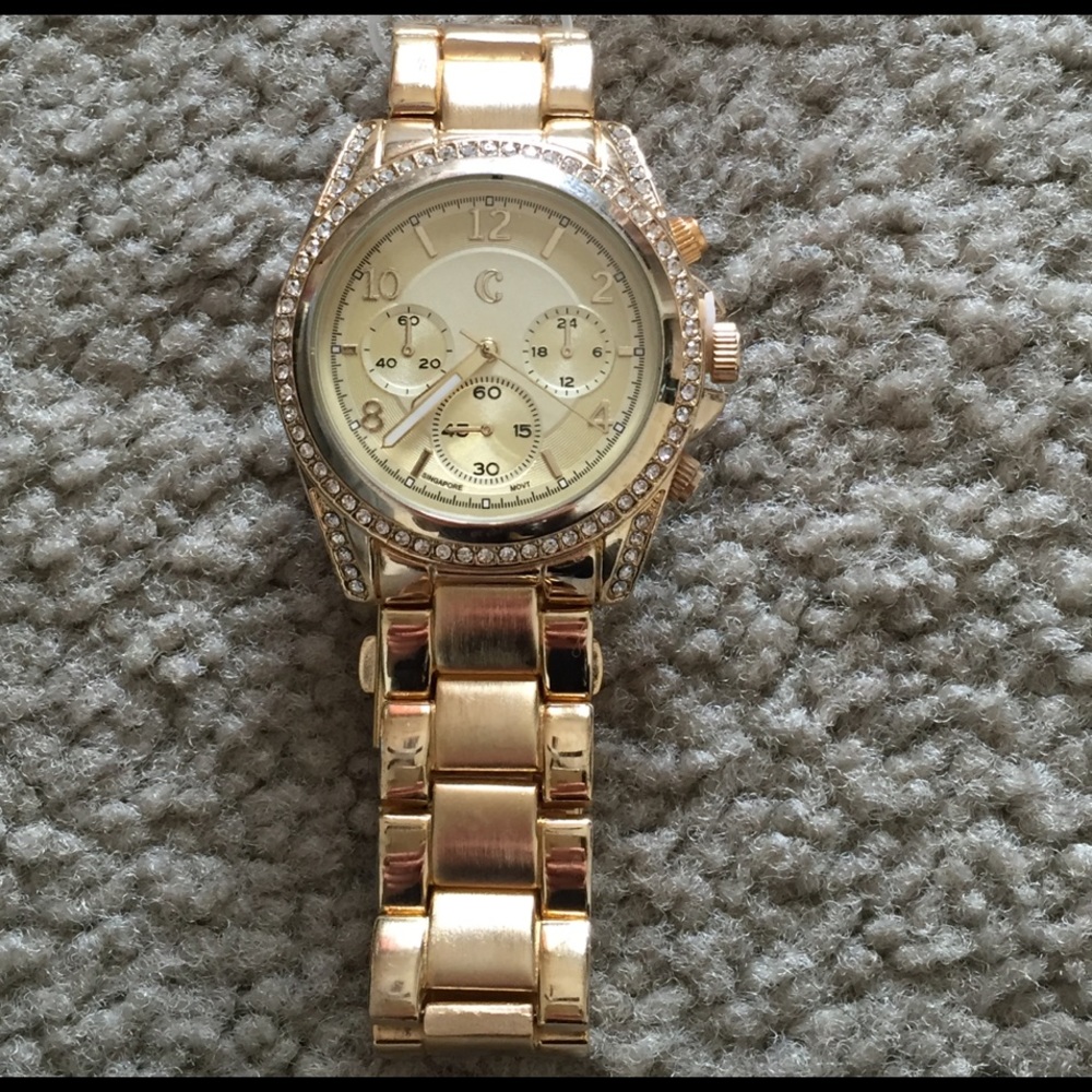 BRAND NEW Charming Charlie Gold watch with crystal