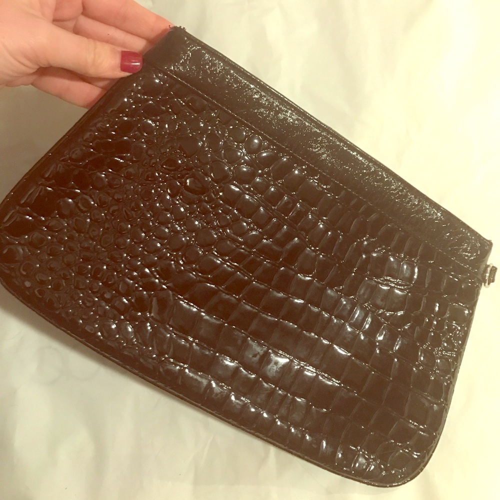 Black Python clutch, hot pink satin interior