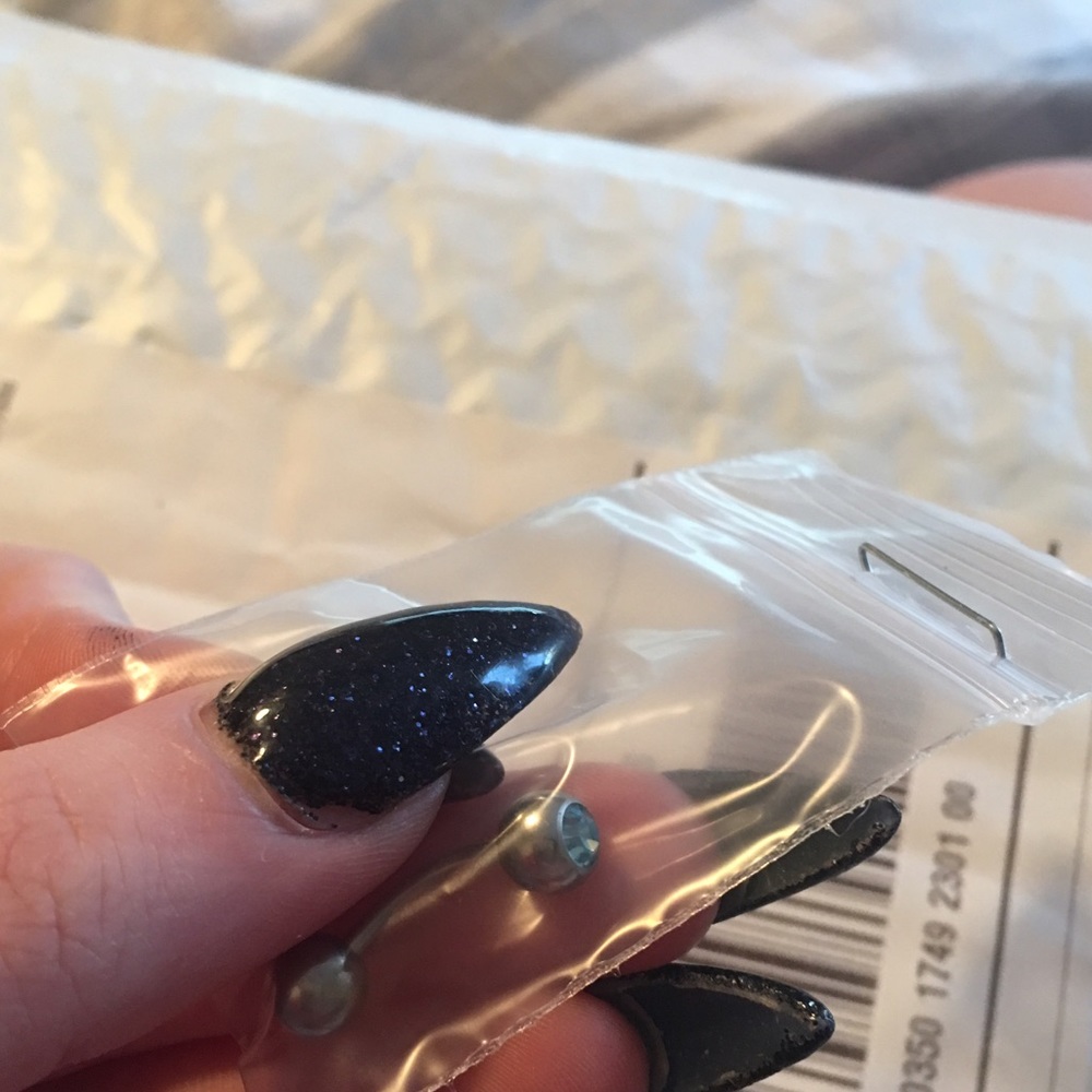 Brand new, curved barbell (14 g, 3/8, 10mm)