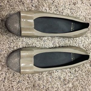 Stuart Weitzman patent studded bow flat shoe