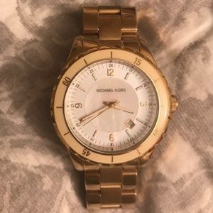 Gold Michael Kors watch.