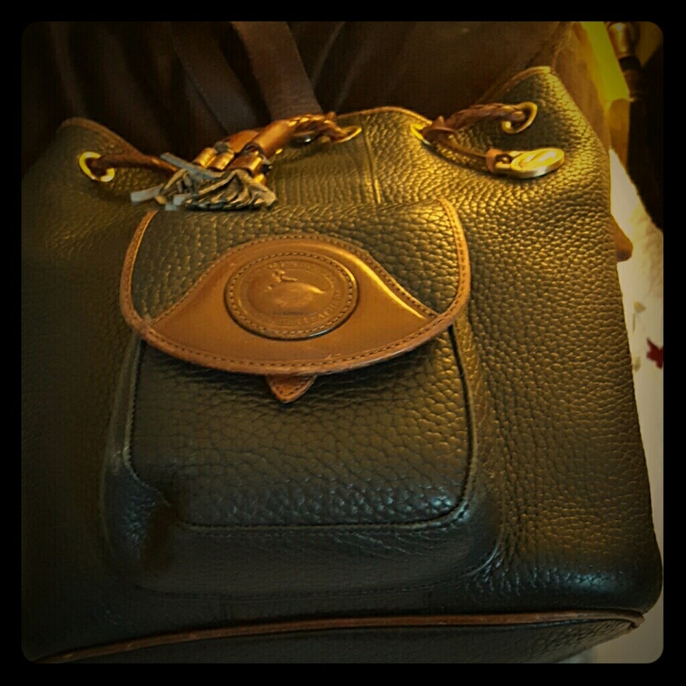 Dooney  and Bourke leather hobo bag in great condi