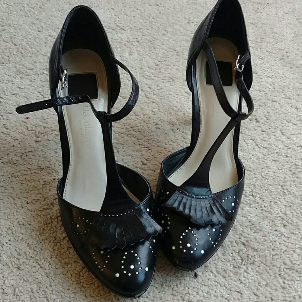 2"heels. Ankle strap, Mary Jane style shoe.