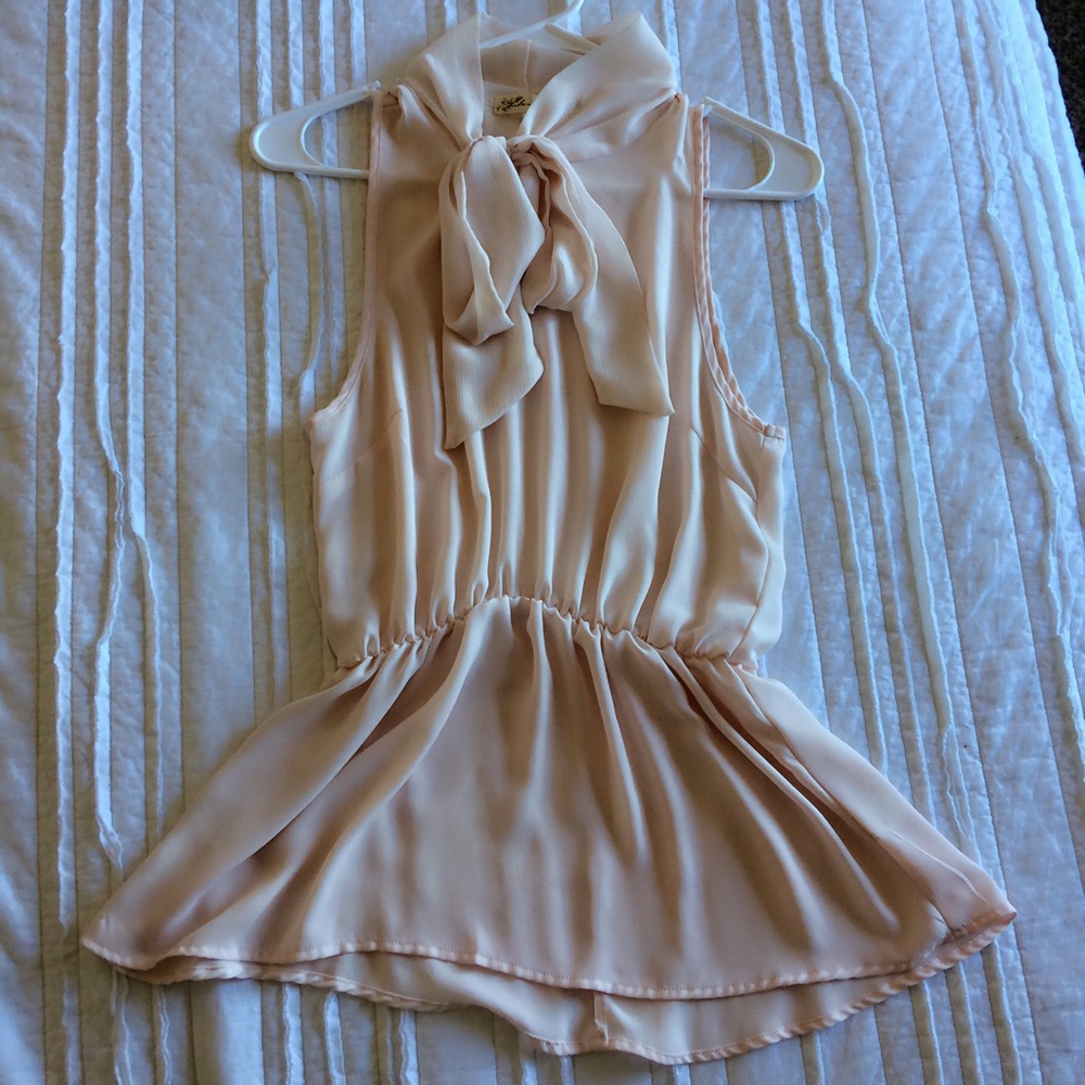 Pale Pink Flowy Sleeveless Blouse