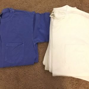 1 large violet pocket tee and 1 large white tee