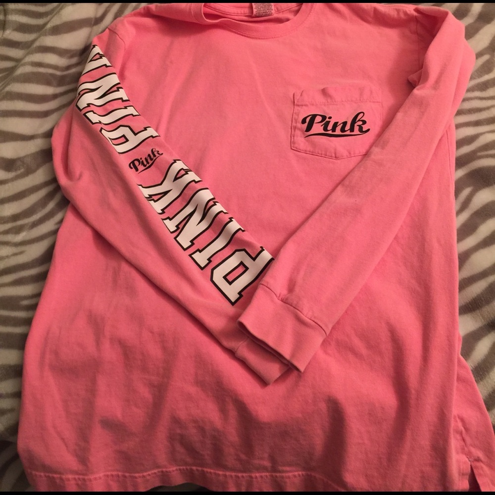 PINK shirt with white writing