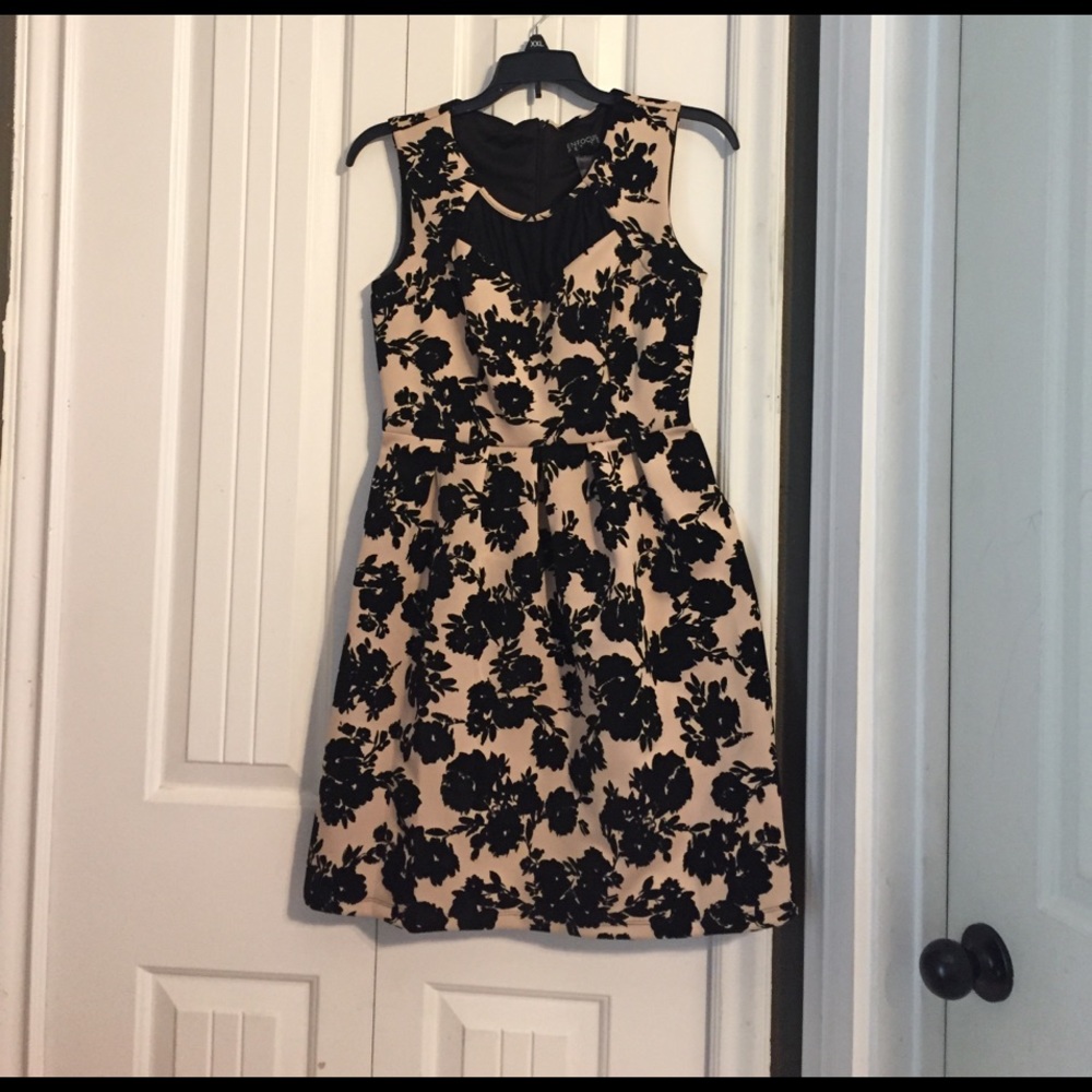 Tan dress with black velvet flowers