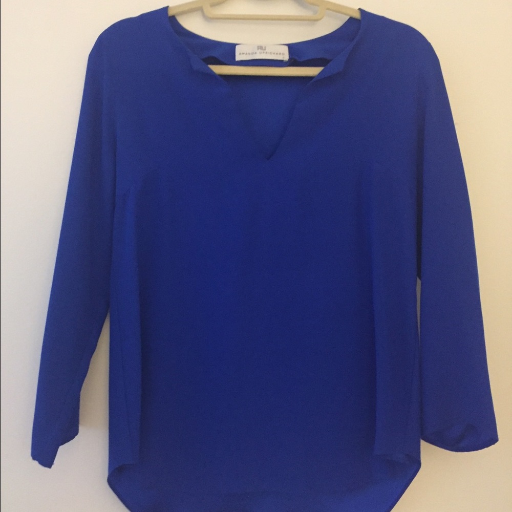Amanda Uprichard electric blue silk blouse.