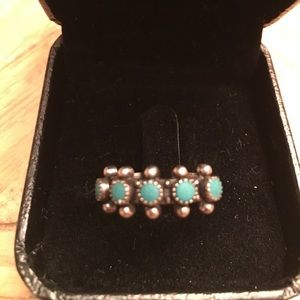 Sterling silver ring with green stones