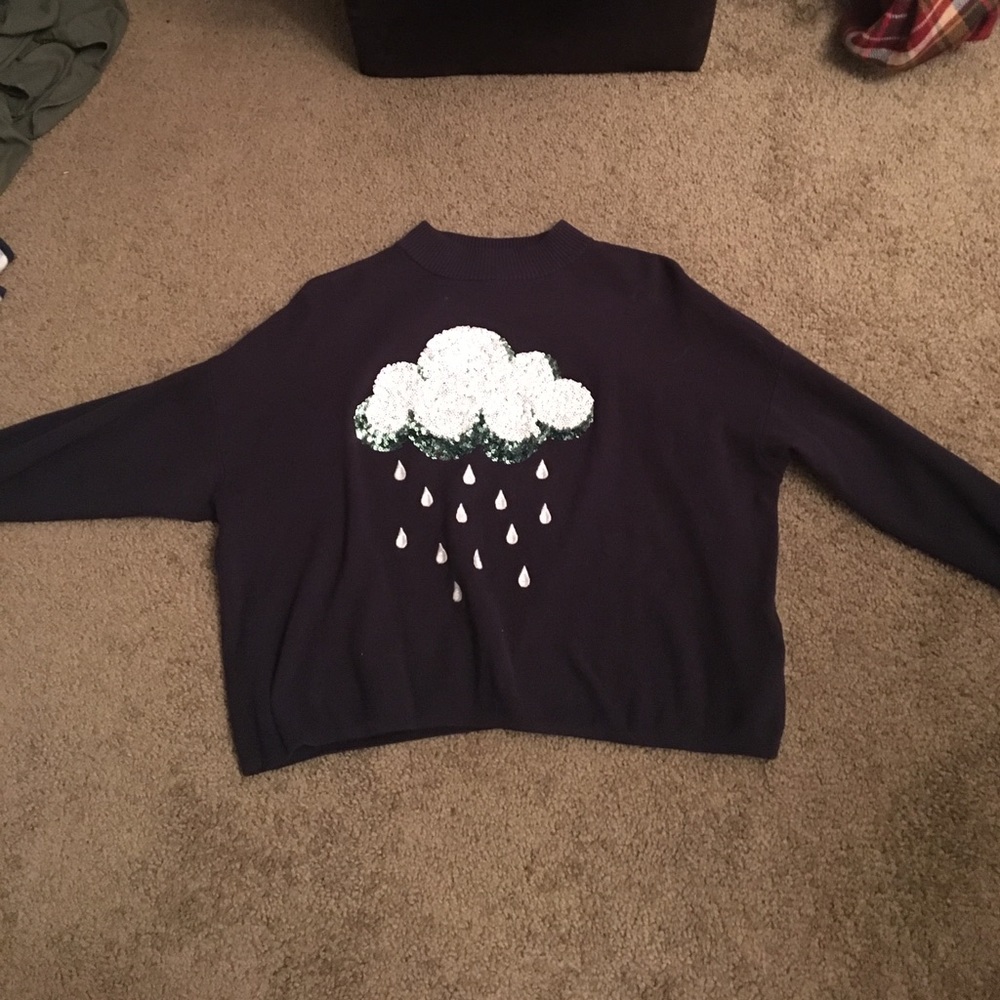 Blue H&M crew neck sweater with sequin cloud