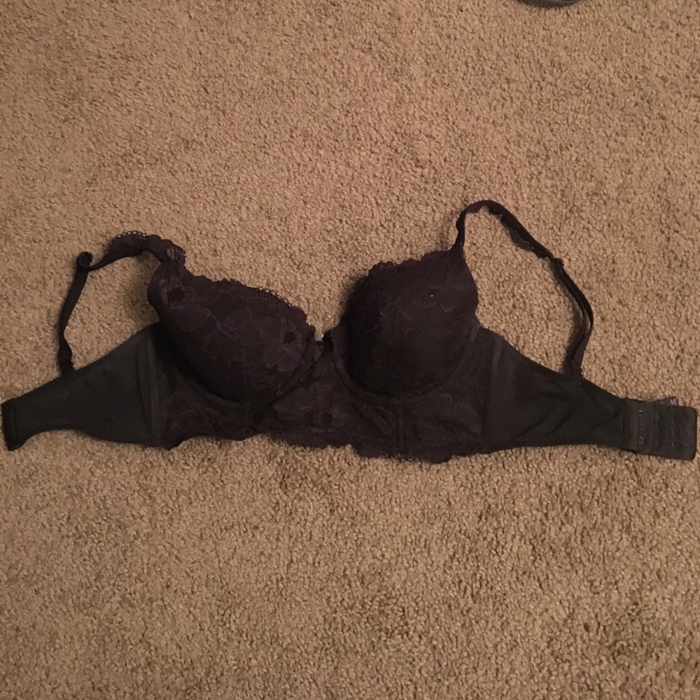 Black lace Victoria's Secret bra with half corset