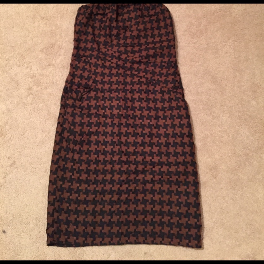 Black and brown houndstooth dress. Knee length