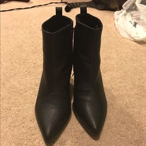 Black pointed toe boots