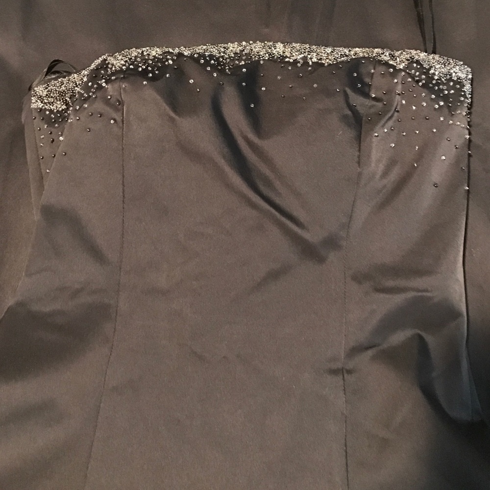 Simple strapless evening gown with beaded detail