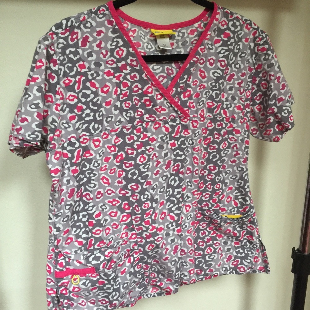 Pink and gray leopard print scrub top