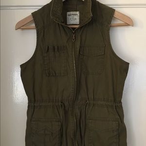 Olive green, sleeveless vest