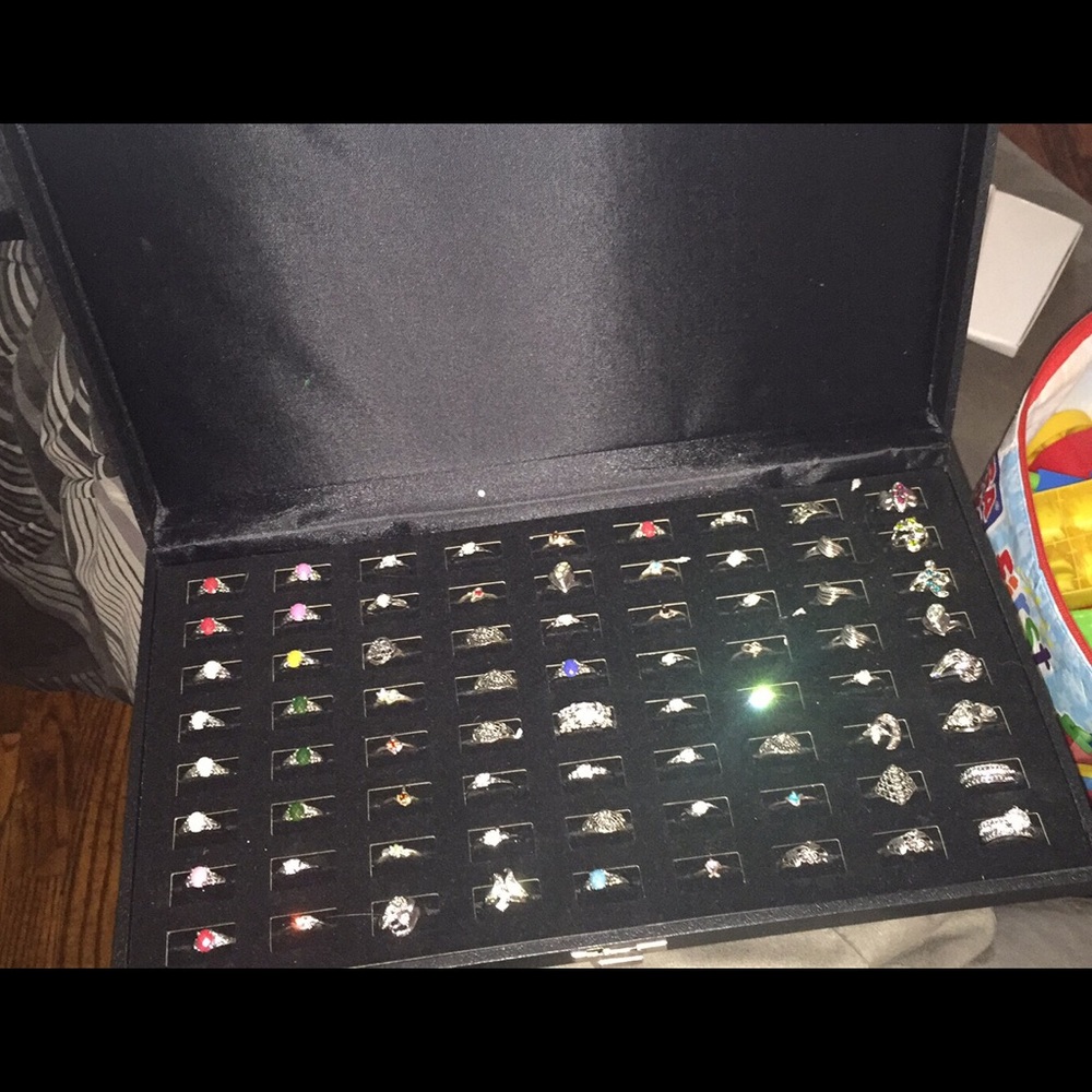 72 assorted sized costume rings with closing case
