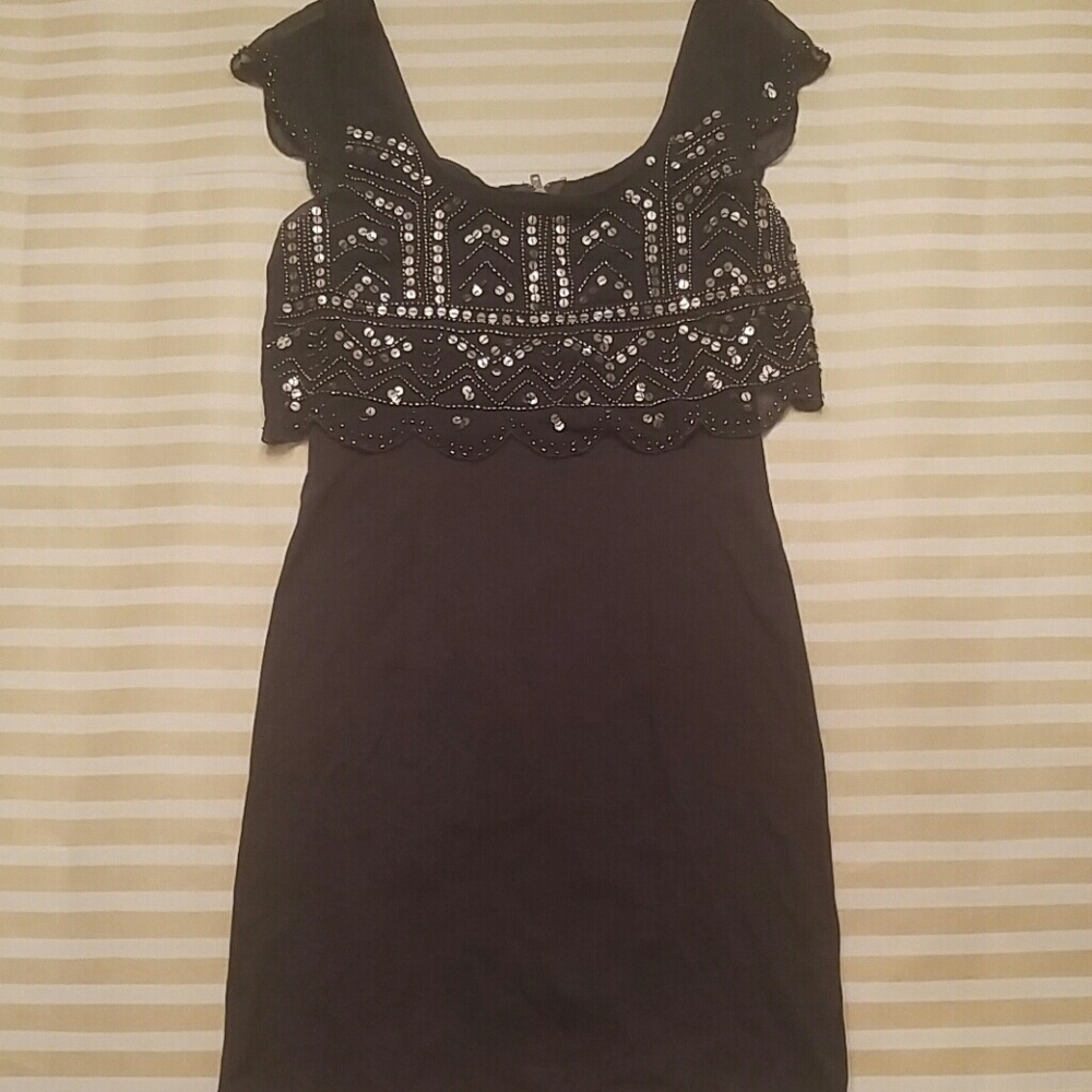 Dark grey body con dress with sequins and beads