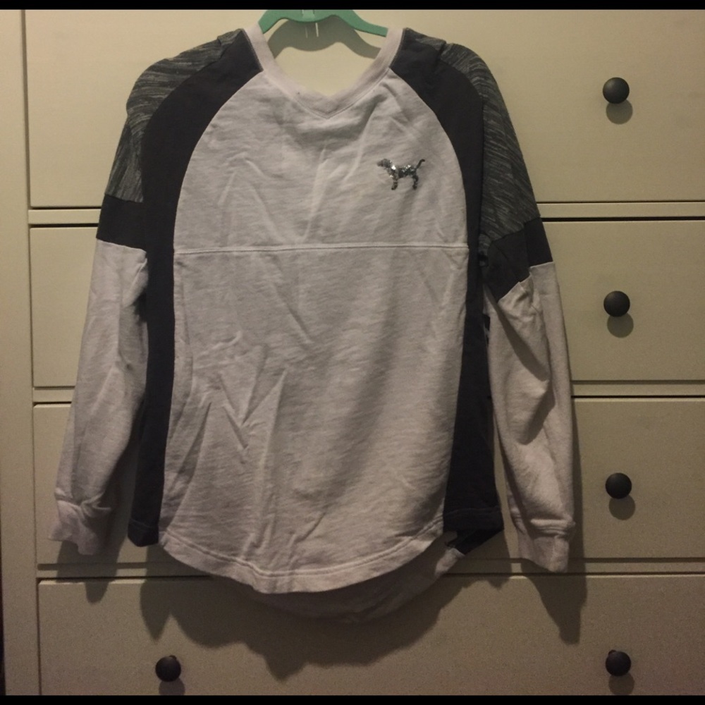 A white pink sweater