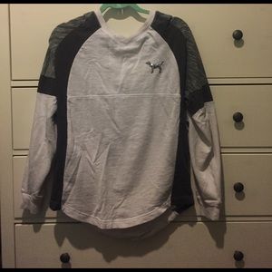 A white pink sweater