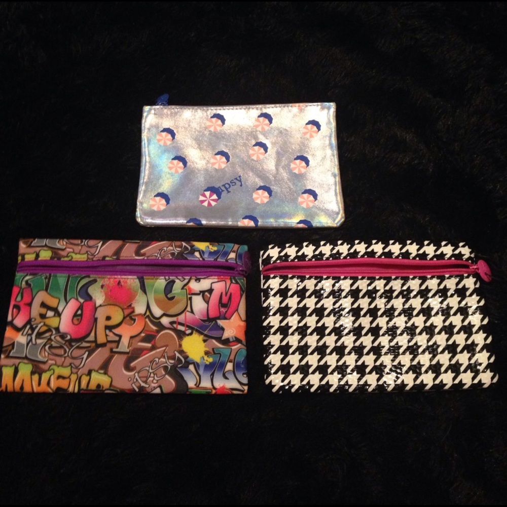 3 makeup bags.