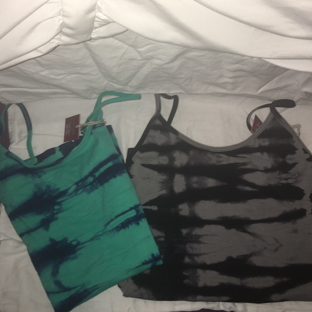 Two tie dye tanks