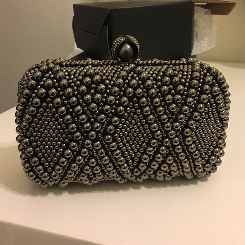 Edgy beaded silver am clutch