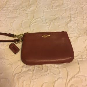 Coach saddle brown wristlet with card slots
