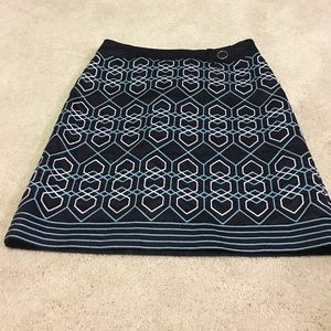 Pencil skirt go nice with black blouse.