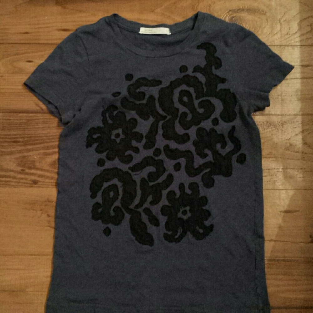 Navy top with black embellishments