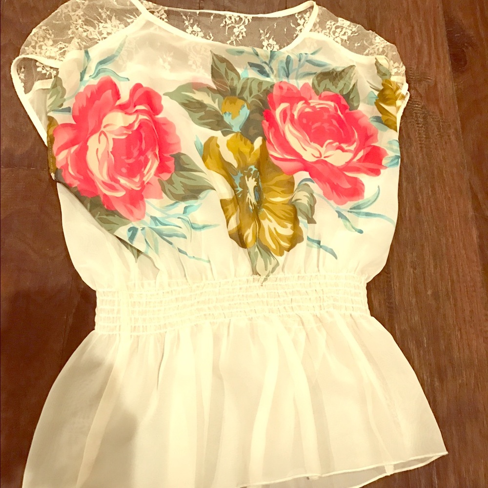Cute see-through blouse by Shasta. Size large.