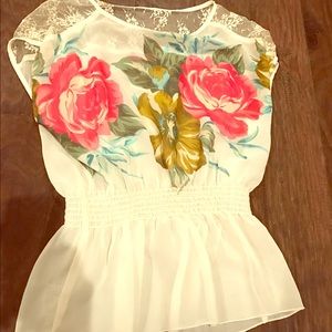 Cute see-through blouse by Shasta. Size large.