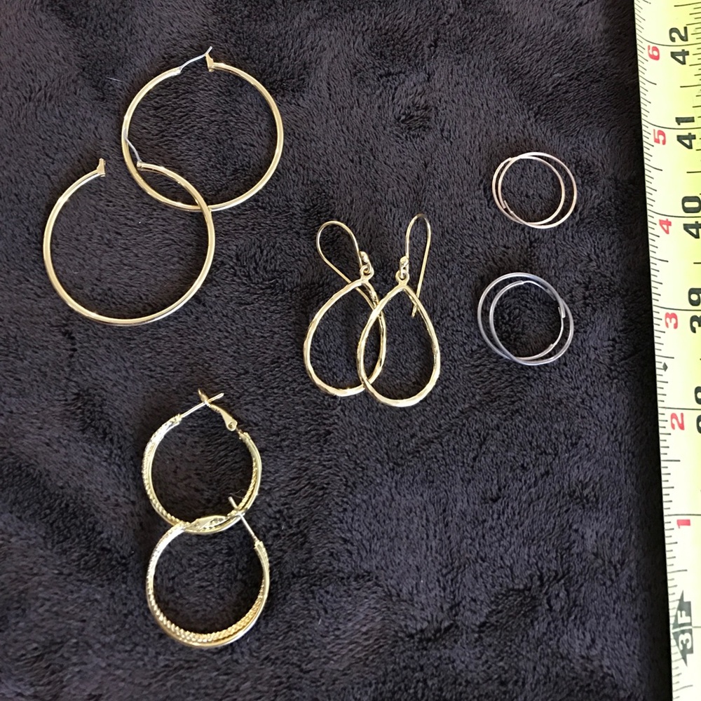 Bundle of gold tone earrings