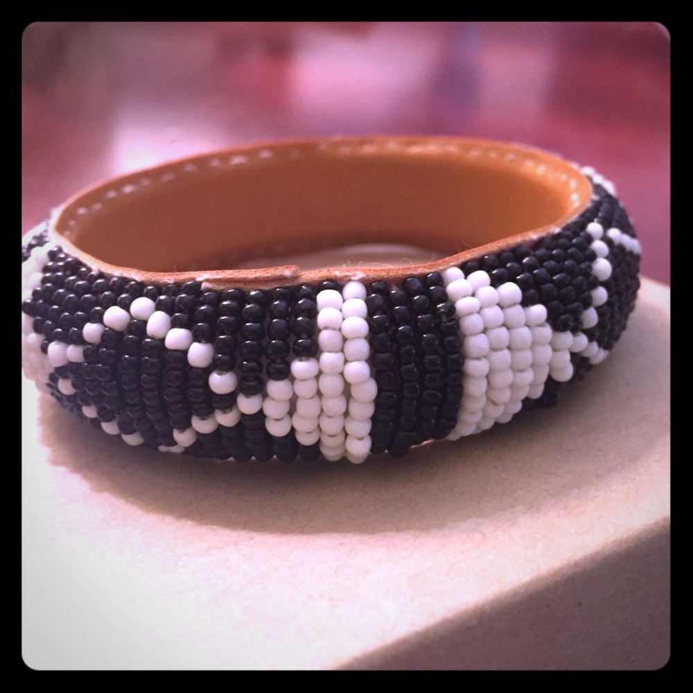 Handmade beaded bracelet with tribal pattern