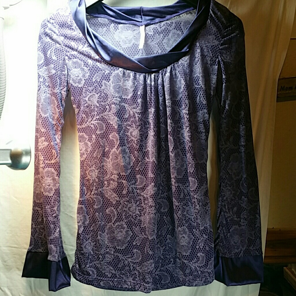 Very cute purple blouse.