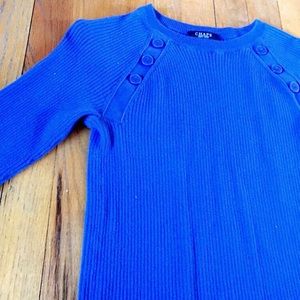Blue sweater with buttons on the shoulders