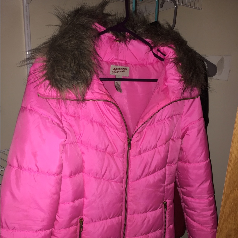 Small, slim fitting. Bought for 65$ worn once.