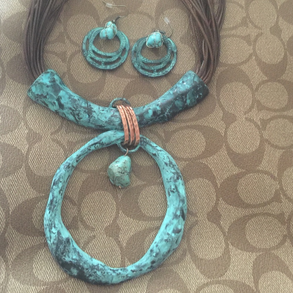 Necklace and earring set.  Necklace on brown cord.