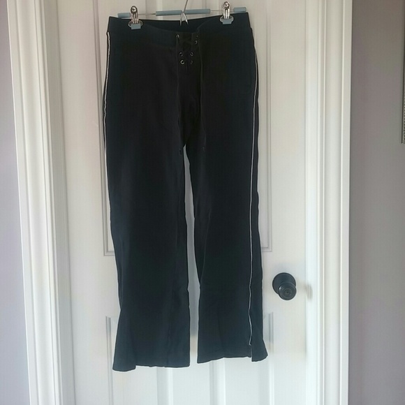 Black lace-up pants. - Picture 2 of 4