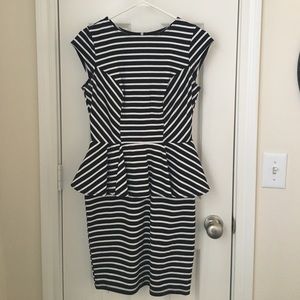 B&W stripped peplum dress. New! Worn once. Size: S